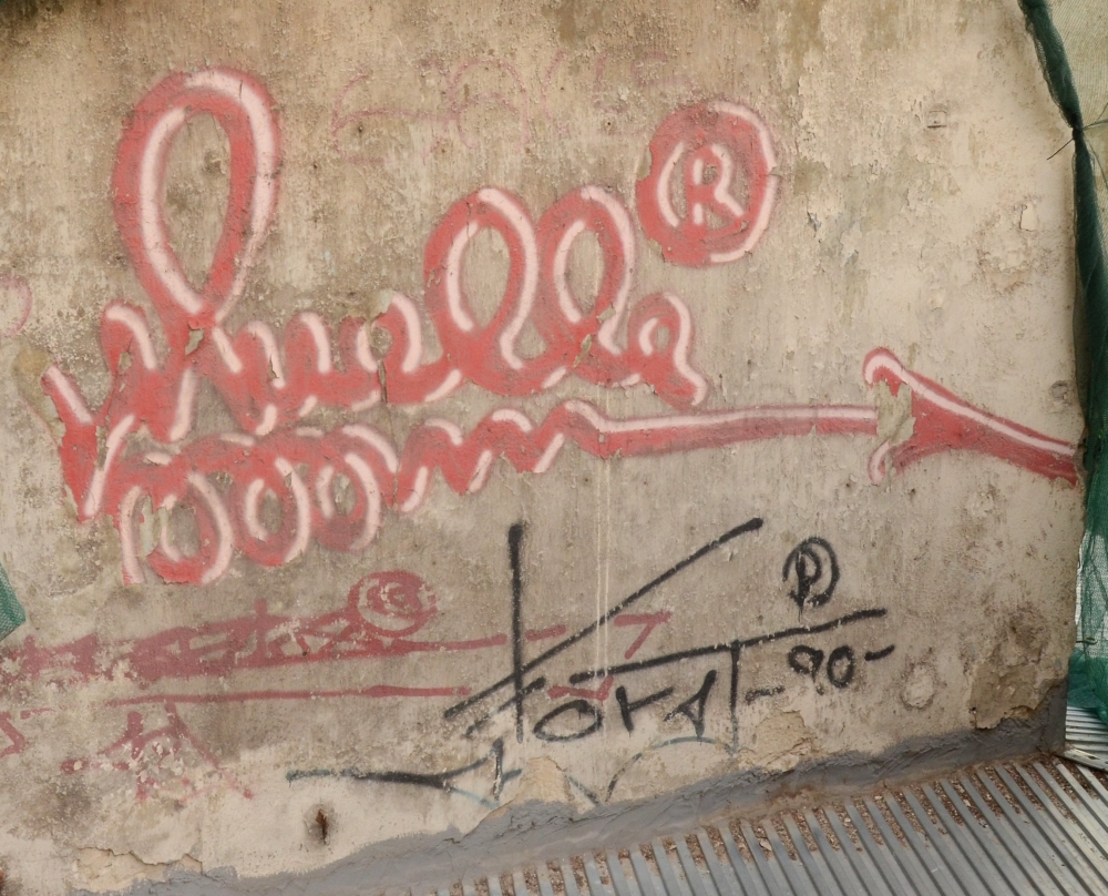 Grafitti de Muelle en la calle Montera, 30