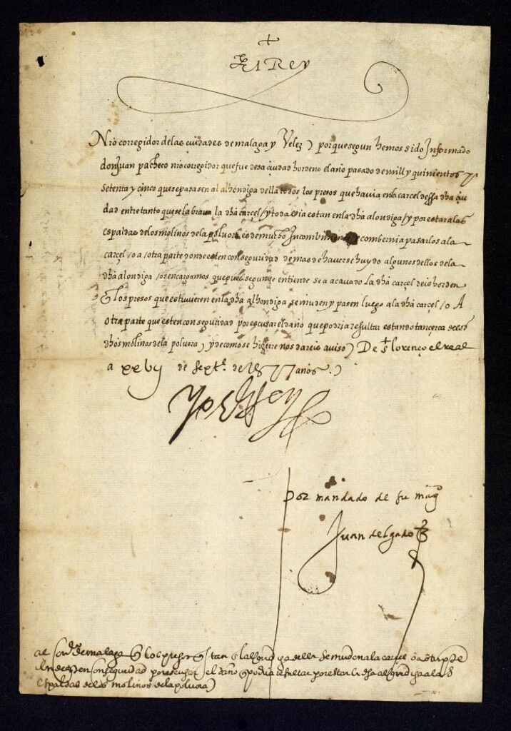 Miniatura de Real cédula de Felipe II a D. Pedro Manrique, corregidor de Málaga y Vélez, ordenando que los presos que fueron trasladados a la alhóndiga por las obras de reparación de la cárcel sean devueltos a ésta, o a lugar más conveniente pues la alhóndiga está a espaldas de los molinos de la pólvora
