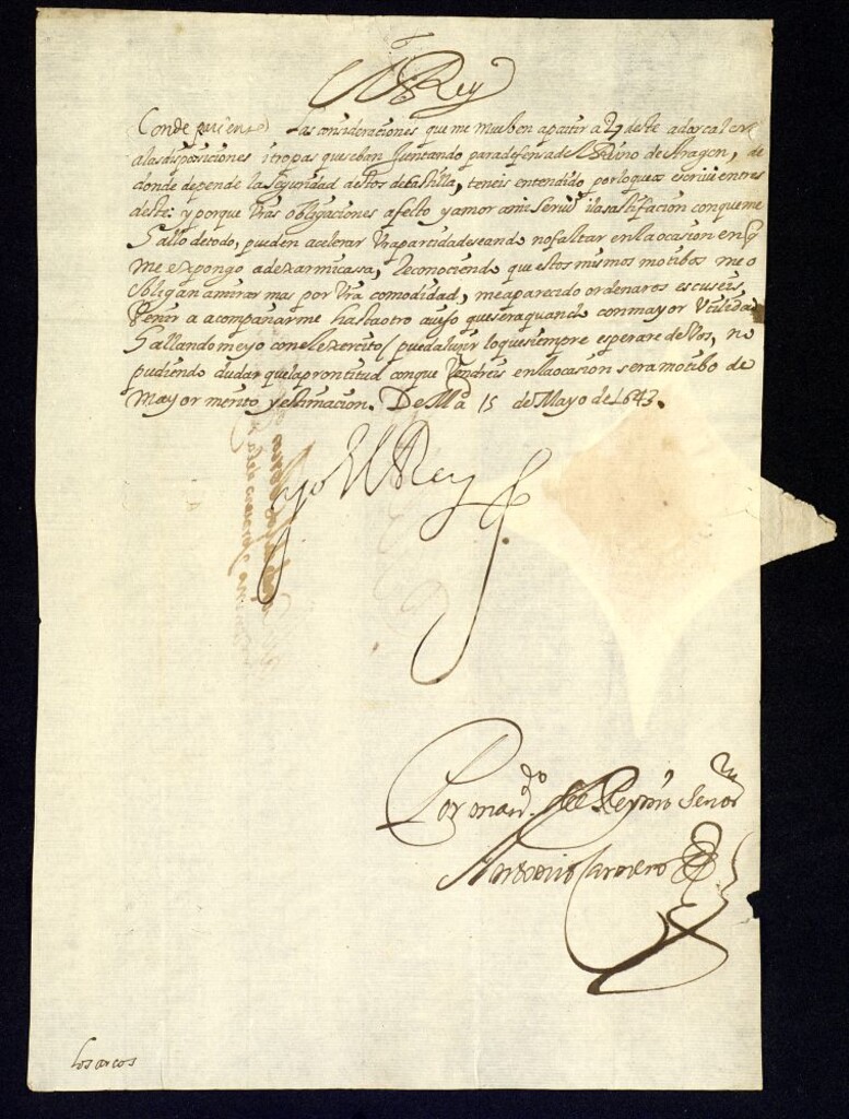 Miniatura de Real cédula de Felipe IV al conde de los Arcos excusándole de venir a acompañarle en el viaje que hace a Aragón para la defensa de este reino.