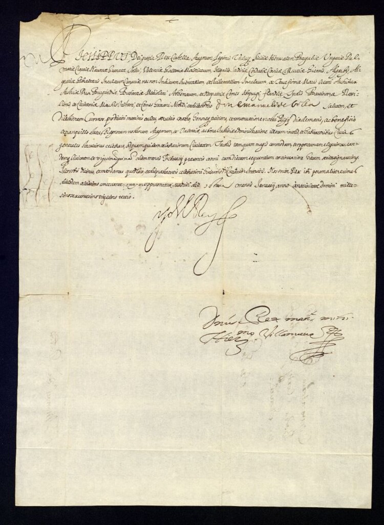 Miniatura de Real provisión de Felipe IV a D. Manuel de Bolea convocándole para las cortes de Aragón que se celebrarán en la ciudad de Teruel.