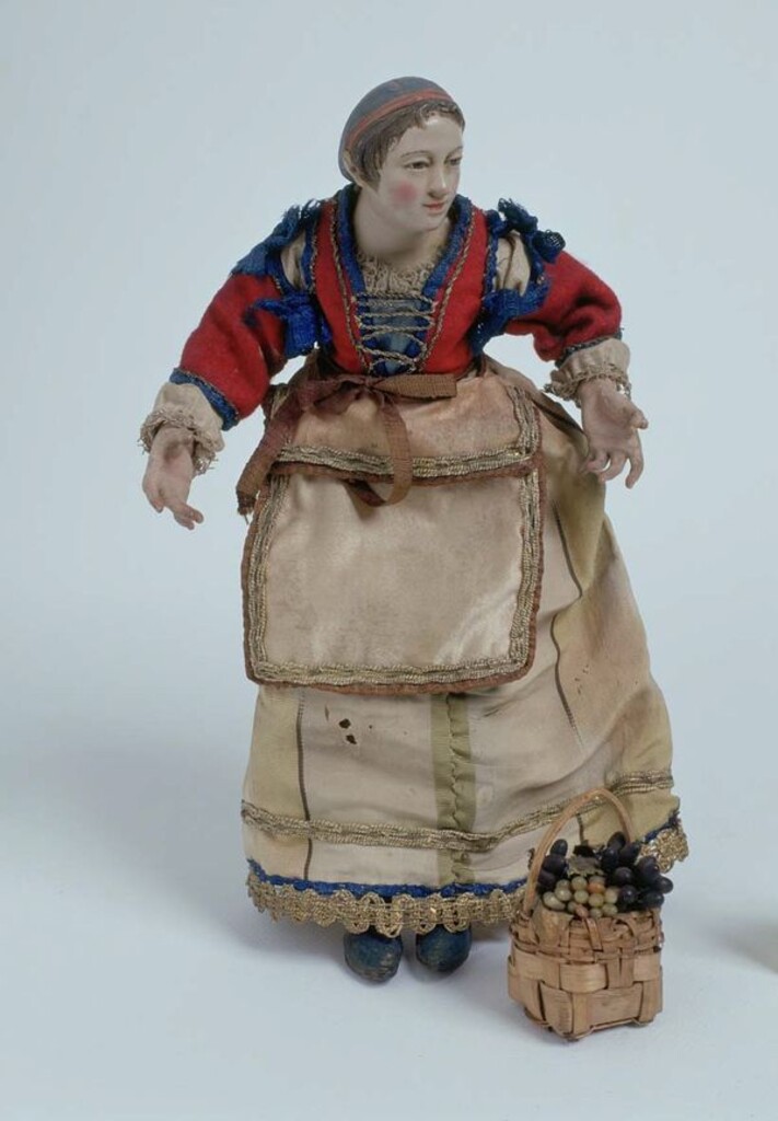 Miniatura de Belén napolitano. Campesina con cestillo de frutas