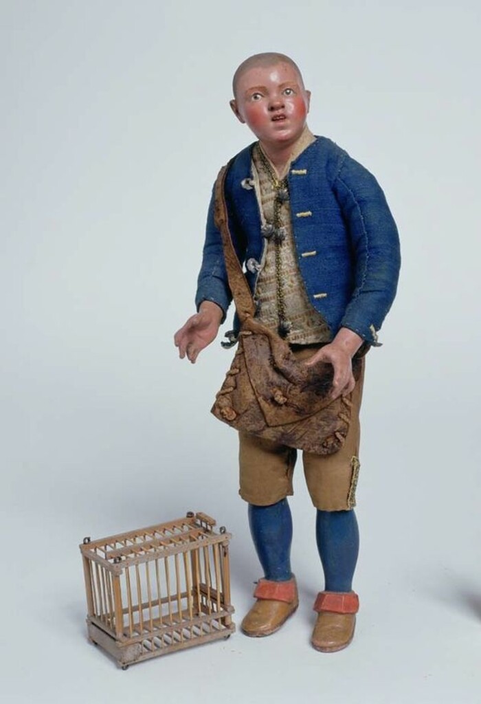 Miniatura de Belén napolitano. Campesino con jaula de pájaros